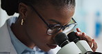Black woman, microscope and scientist with medical analysis for experiment, test or innovation. Biology, science equipment and worker with research for biotechnology, study or cure development in lab