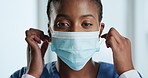 Face, mask and medical with nurse black woman in hospital for internship or residency as student. Friendly, healthcare and smile of medicine professional in clinic for end of medicare treatment