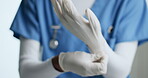 Hands, person and nurse with gloves at hospital for safety, healthcare ppe and virus control. Portrait, person and medical procedure for hygiene protocol, prevent infection and surgery preparation