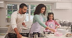 Parents, girl and baking cupcakes in kitchen, happy and learning for skills, food or development at home. People, mother and daughter with father, dessert or smile for helping hand at family house