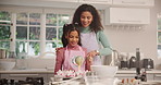 Mom, girl child and baking cupcakes in home, happy or learning for skills, food or development in kitchen. People, mother and daughter with teaching, dessert or smile for helping hand at family house
