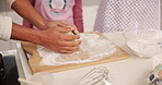 Baking, ball and hands of parent with child in kitchen together for development or learning. Cooking, flour and sprinkle with family rolling dough in apartment for helping, how to or teaching