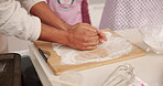 Baking, dough and hands of parent with child in kitchen together for development or learning. Cooking, food and flour with family rolling ball at counter in apartment for helping, how to or teaching