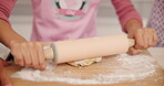 Baking, hands or pin with child and parent in kitchen together for development or learning. Cooking, dough and food with family rolling at counter in apartment for helping, how to or teaching
