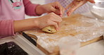 Baking, dough and hands of parent with child in kitchen together for development or learning. Ball, cooking and flour with family rolling ingredients in apartment for helping, how to or teaching