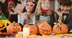 Halloween, party and pumpkin with children in home for celebration, bonding and fun together. October wave, friends and excited kids with hobby for holiday activity, vacation and festive tradition