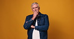 Face, thinking and senior man in studio, problem solving and planning on yellow background. Portrait, space and mature person with ideas, decision and choice with wonder, thoughtful and contemplation
