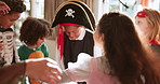 Halloween, dance party and family with kids in home for celebration, bonding and fun together. October, parents and excited children with music for holiday energy, costume and festive tradition