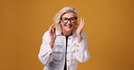 Face, mature woman and glasses in studio background to check lens, eye care and clear vision. Portrait, female person and correct prescription, frame style and testing comfort of eyesight improvement