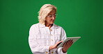 Tablet, stylus and thinking with woman in studio for graphic designer, reflection and logo developer. Creative media, research and idea with mature person on green background for online artist