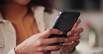 Hands, home and woman with smartphone, typing and social media with communication. Closeup, apartment and person with cellphone, internet and digital app with texting,  and message to contact or chat
