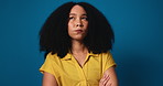 Frustrated, woman and arms crossed with attitude in studio for whatever, moody and defensive. Mockup space, african person and chewing bubblegum on blue background with negative behavior and arrogant