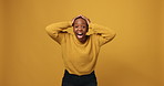 Happy, black woman and face with surprise for winning or good news on a studio background. Portrait, female person or African model with shock, smile or fist pump in celebration for prize on space