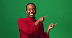 Happy, black woman and pointing with presentation in studio for advertising on a green background. Portrait, female person or model with smile or showing list for marketing or options on mockup space