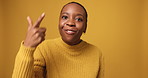 Face, black woman and pointing for confrontation in studio background for threat, argument and accusation. Angry, female person and betrayal reaction, verbal fight and bad attitude for conflict blame