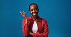 Happy, black woman and laughing with face in studio for funny joke or humor on a blue background. Portrait, female person or African model with smile for comedy, gossip or rumor on mockup space