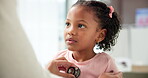 Clinic, hands and child with doctor for breathing test, checkup or treatment. Heartbeat, medical help and healthcare pediatrician consulting in office with sick kid, stethoscope or lungs assessment