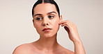 Touch, beauty and hands with woman in studio for skincare, self care and glow aesthetic. Collagen, dermatology and shine with female person on white background for mockup space and clear skin