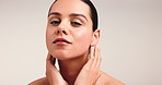 Beauty, natural and face of woman in studio for skincare, dermatology and white background. Mockup space, hands on skin and female person with facial glow, cosmetology and self care cosmetics