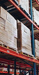 Empty, warehouse and stock on shelf, supply chain and goods for shipping, logistics or distribution. Commercial building, production and merchandise boxes for import, storage and package in factory