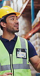 Man, contractor and discussion with storage in warehouse for inventory, safety and security. Businessman, logistics or quality control with helmet for shipping, stock management or export business