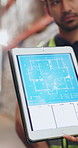 Person, meeting and blueprint on tablet screen for warehouse design, floor plan and expansion. Contractor, digital and review sketch of factory layout, planning renovation and maintenance information