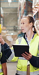 Warehouse worker, team and woman with tablet for logistics, inventory and discussion. Technology, factory and engineer with collaboration for inspection with supply chain, stock and cargo storage
