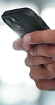 Hands, smartphone and person with internet, typing and communication with social media. Closeup, mobile user and cellphone with connection, texting and message to contact, network and digital app
