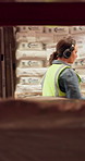 Logistics, worker and dancing with headphones in warehouse for music, inspection and fist bump. Energy, people and feel good playlist for shipping success, distribution service and target celebration
