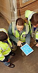 Above, tablet screen and blueprint with people in warehouse, discussion and distribution center renovation. Floor plan, factory layout with team with tech for shipping storage expansion and design