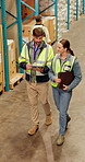 Walking, logistics engineer and people with tablet, factory and preparing for distribution of stock. Team, inventory and discussion with tech for supply chain, shipping and colleagues in warehouse