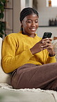 Happy, phone and black woman on sofa in home with networking, communication or social media. Technology, smile and African female person with cellphone for contact on mobile app in living room.