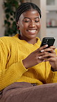 Happy, cellphone and black woman on sofa in home with networking, communication or social media. Technology, smile and African female person with phone for contact on mobile app in living room.