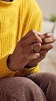 Hands, nervous and person with anxiety at house for depression, psychology grief and trauma. Woman, stress and fidget habit for mental health, negative memory and phobia problem and loneliness worry
