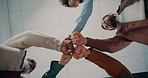 Creative, people and meeting with fist bump in office for teamwork, agreement and motivation. Below, staff and hands together for collaboration, company huddle and employees support for solidarity