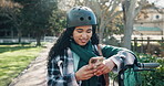 Park, phone and woman with electric scooter for online chat, social media and connection outdoor. Happy, typing and person on smartphone with eco friendly, carbon footprint and sustainable transport