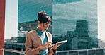 Tablet, walking and business woman outdoor to scroll email, property development or think. Technology, city and urban planner with app for infrastructure, idea and reflection with vision on rooftop
