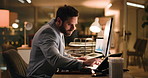 Night, tablet and businessman on computer in office for financial review, risk assessment and investment. Deadline, working late and person on tech for finance proposal, budget report and research