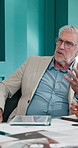 Boardroom, discussion and mature man with team, CEO and paperwork for investment proposal or project. Corporate, boss and talking to people for funding opportunity, collaboration and meeting for plan