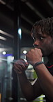 Boxing, fitness and black man in gym for training, workout or MMA challenge with power. African person, boxer and punch for combat sports, fight practice and martial arts exercise for self defense