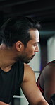 Men, boxer or chat with break in gym for fighting experience, training or rest together. Male people, friends or social with conversation or boxing gloves for sparring, rules or regulations in studio