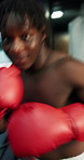 Black man, face or fight with boxer in arena for self defense, tournament or sparring match in gym. Portrait, male person or fighter with boxing gloves in POV or ring for punch, challenge or knockout