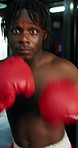 Black man, face or punching with boxer in arena for self defense, tournament or spar match in gym. Portrait, male person or fighter with boxing gloves in POV for fighting challenge in knockout ring