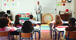 Kindergarten, kids and listening with teacher in classroom for education, studying and lesson. Learning, child development and growth with students and man in school for creative, help and support