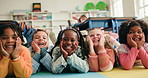School kids, group and face on floor in classroom, laugh and excited for education at academy. Children, boy and girl with friends, portrait and together for learning, smile and funny joke on mat