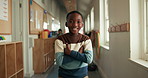 Happy, education and face of black child at school with confidence with learning or development. Smile, student and portrait of African boy kid from Kenya with pride for academic growth at campus.