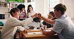Fist bump, education and students in classroom, support and happiness with creative project. Art session, friends and group in school, hand gesture and knowledge with achievement, smile and learning