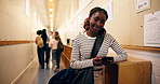 Happy, phone and face of student in hallway at college for education, learning and campus news. University, school and portrait of girl on smartphone for social media, online connection or mobile app
