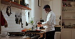 Salt, cooking and meat with black man in kitchen for personal chef, nutritionist and meal prep. Healthy food, seasoning and home cook with person in house for steak, dinner and gourmet cuisine