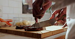 Hands, knife and steak with chef in kitchen of restaurant to prepare culinary dish or gourmet meal. Cuisine, protein and slice with person cutting beef or meat for cooking, diet and nutrition